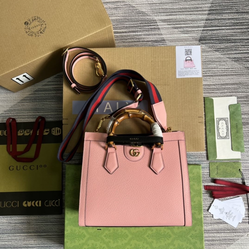 G*u*i top handle bags